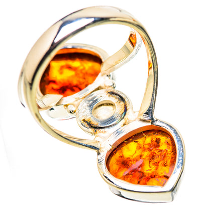 Sterling silver ring side view with two pear amber stones and a round rainbow moonstone