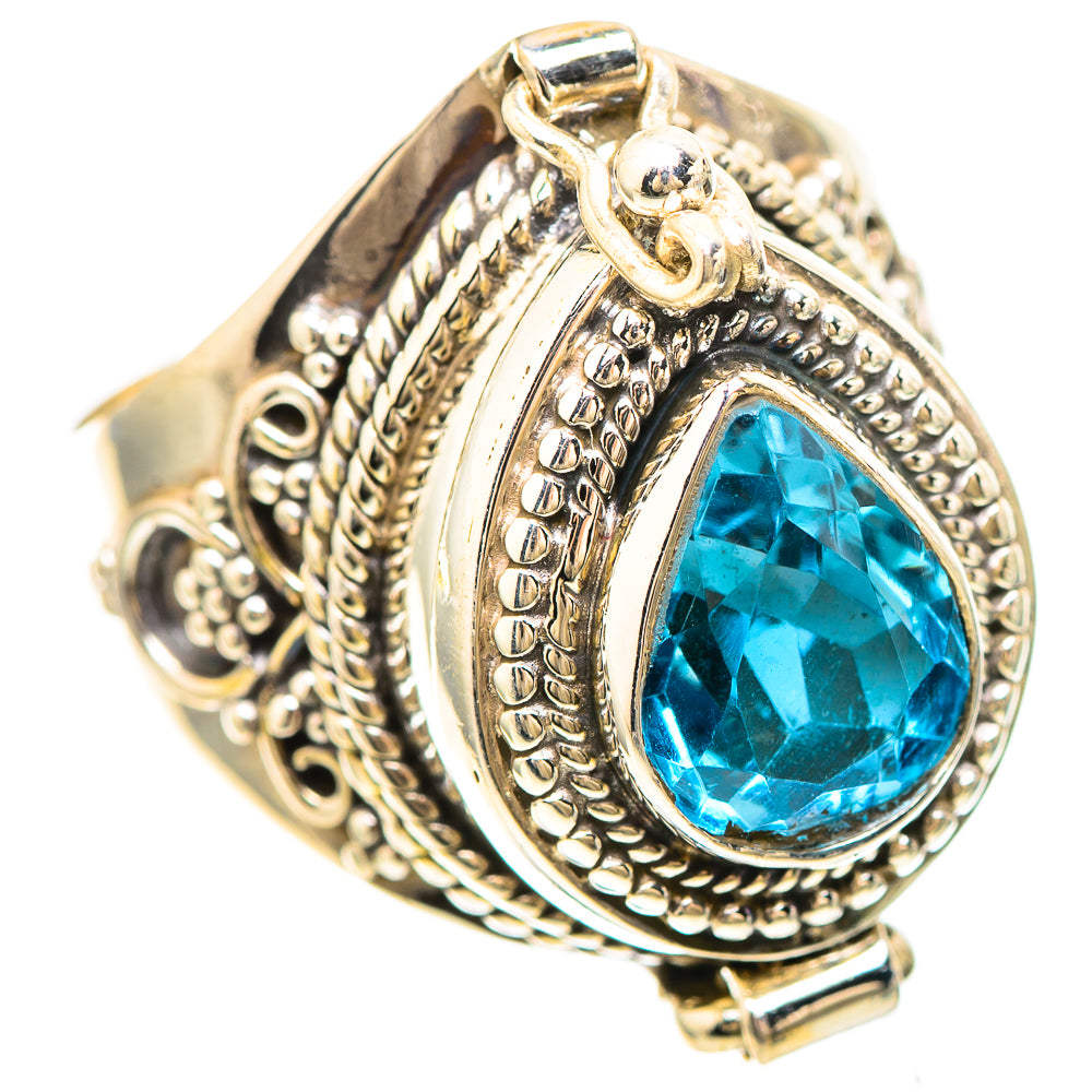 Sterling silver ring with oval blue topaz stone, engraved filigree border, size 8