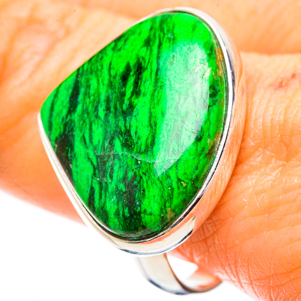 Sterling silver ring with teardrop-style oval green stone, close-up on finger, size 10
