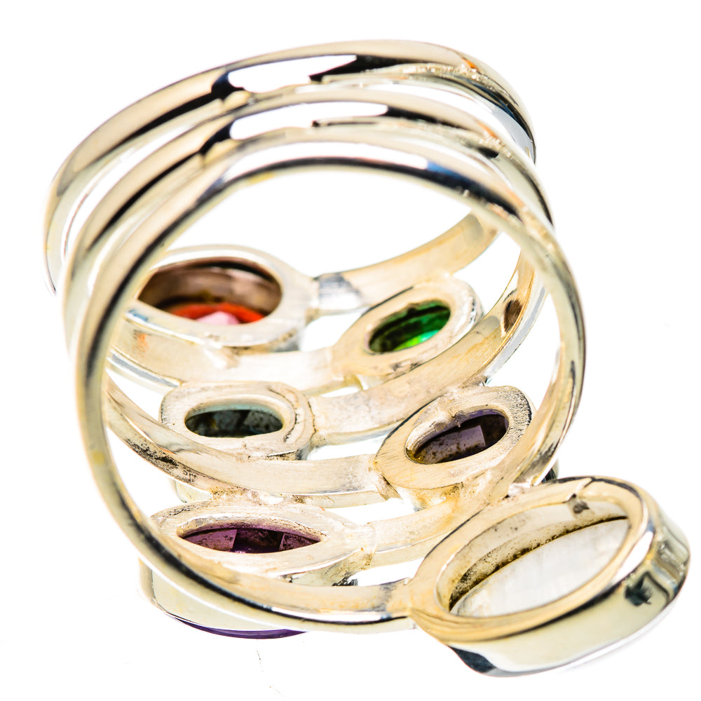 Sterling silver openwork ring with set red, green, blue, purple stones and pale moonstone