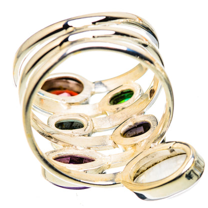 Sterling silver openwork ring with set red, green, blue, purple stones and pale moonstone