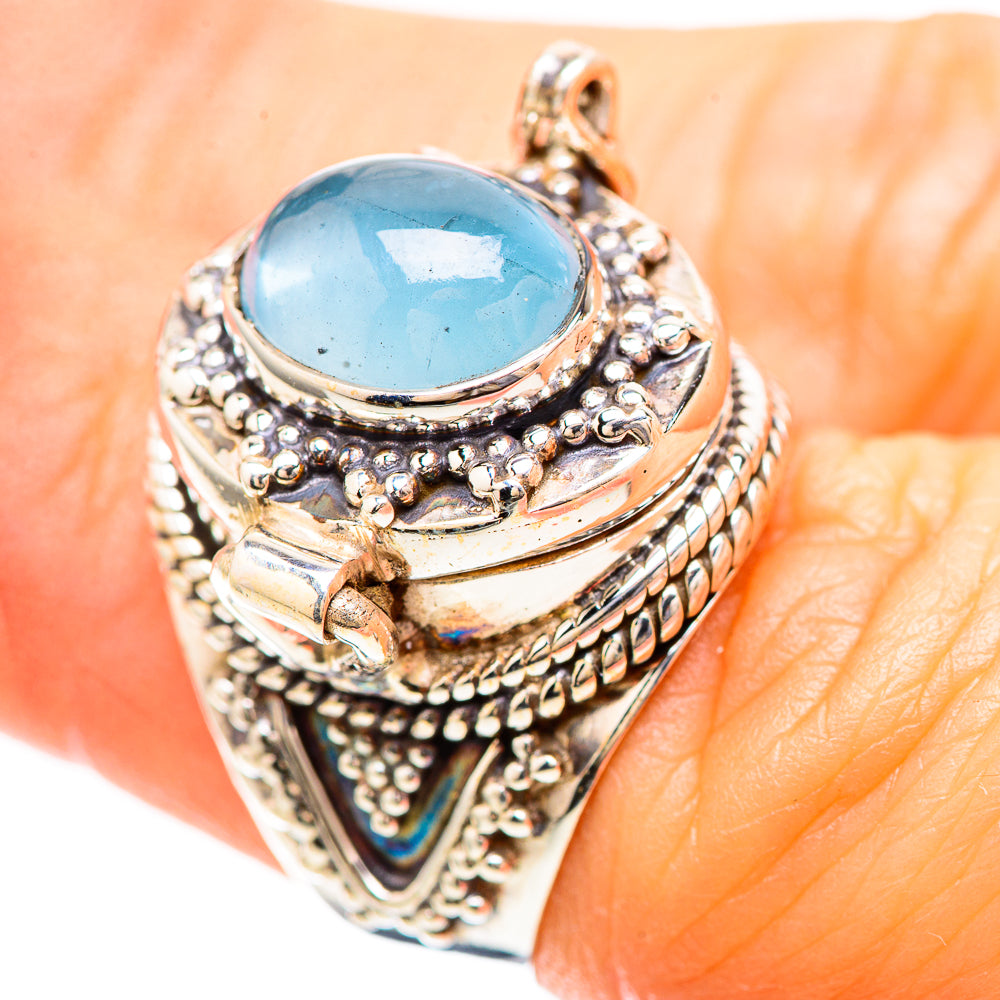Sterling silver aquamarine oval ring with studded tribal detailing and braided band