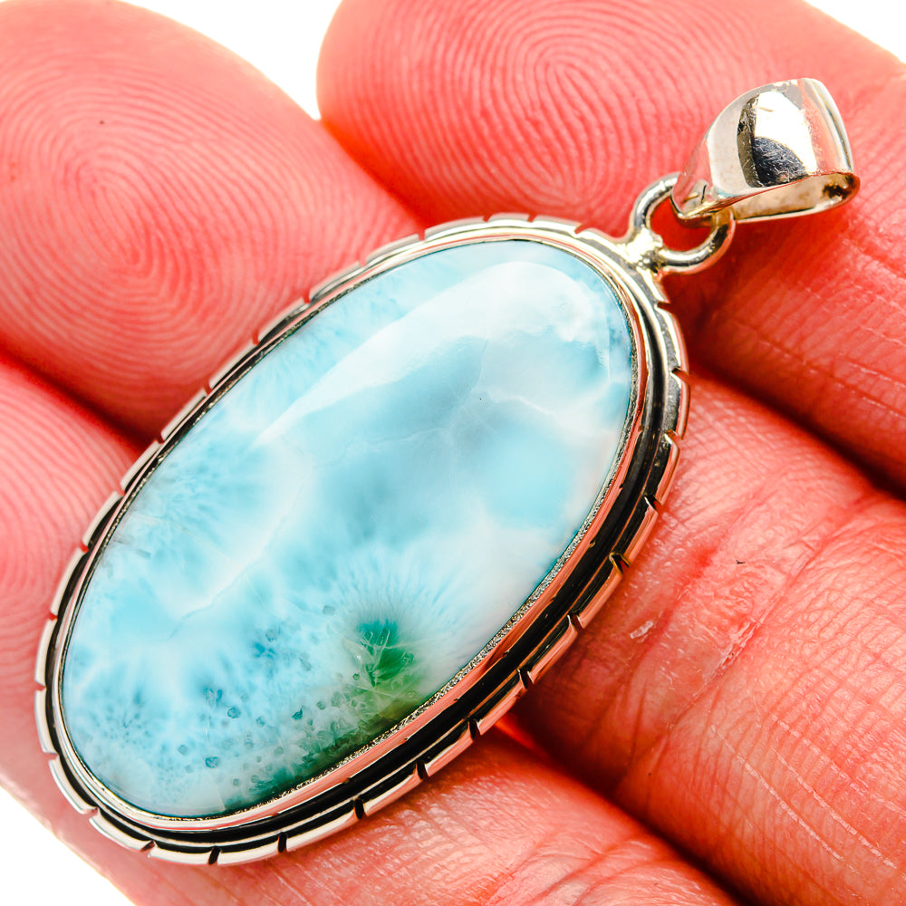 Larimar pendant with oval blue-green gemstone in 925 sterling silver bezel