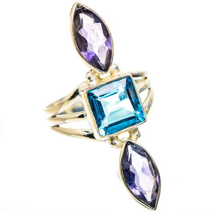 Silver-tone ring with marquise purple stones and square blue center stone
