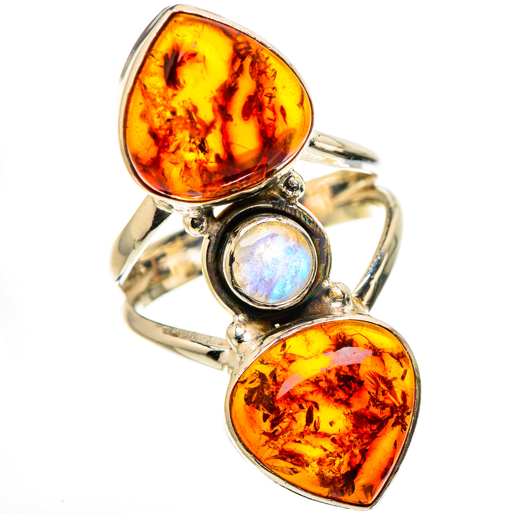 Sterling silver ring with two pear amber gemstones and a round rainbow moonstone