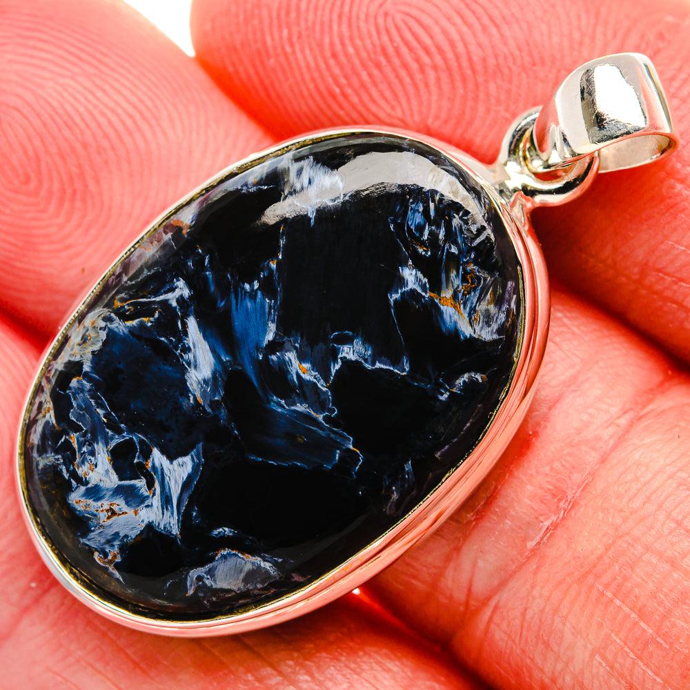 Sterling silver pietersite pendant with oval blue-black stone and hinged bail