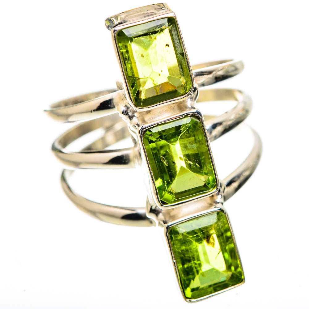 Sterling silver ring with three square green peridot gemstones stacked in prongs