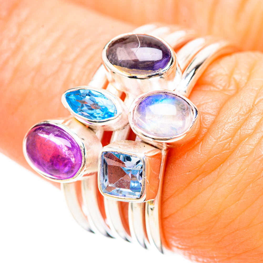 Multi-stone sterling silver ring with oval purple, blue, and clear gemstones