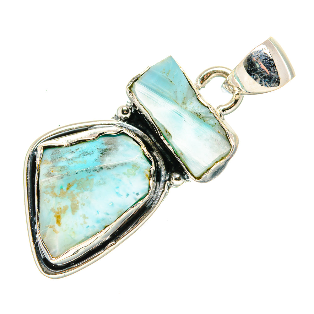 Sterling silver rough aquamarine teardrop pendant with open-backed frame and bail