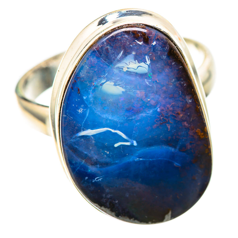 Sterling silver ring with oval blue boulder opal, polished bezel setting