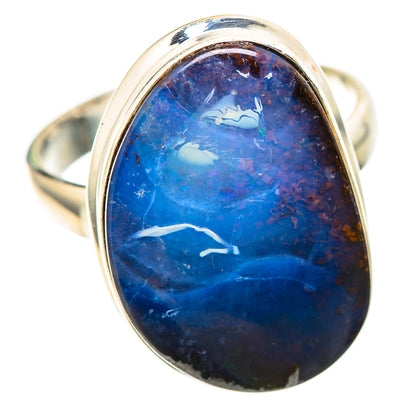 Sterling silver ring with oval blue boulder opal, polished bezel setting