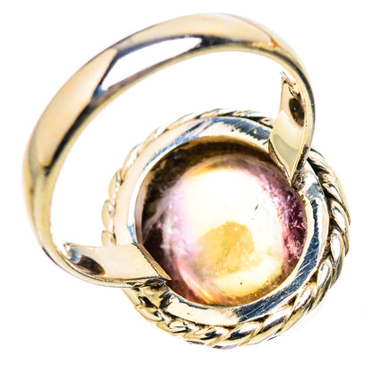 Oval ametrine cabochon ring with braided bezel and polished sterling silver band
