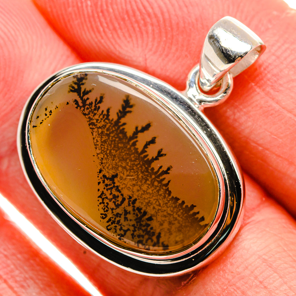 Oval dendritic agate pendant in sterling silver, amber stone with dark tree-like inclusions