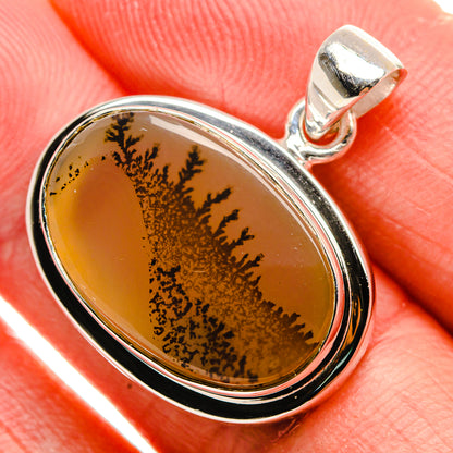 Oval dendritic agate pendant in sterling silver, amber stone with dark tree-like inclusions