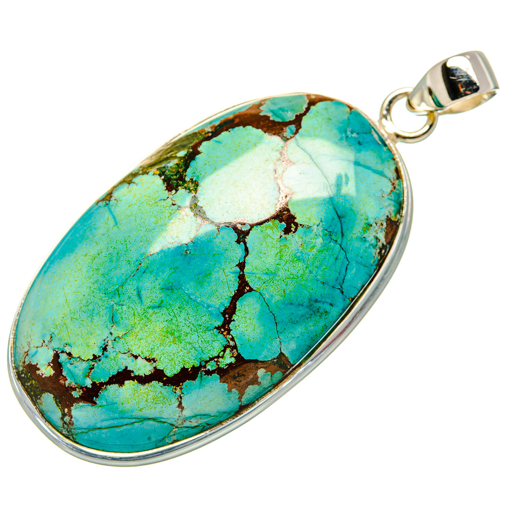 Turquoise oval pendant on silver bail, bezel-set with natural matrix