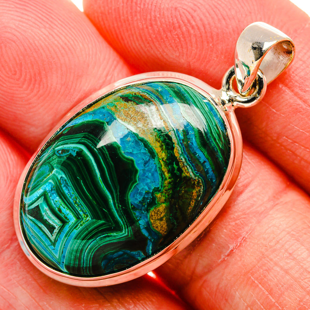 Malachite and chrysocolla oval pendant in silver bezel with teardrop bail