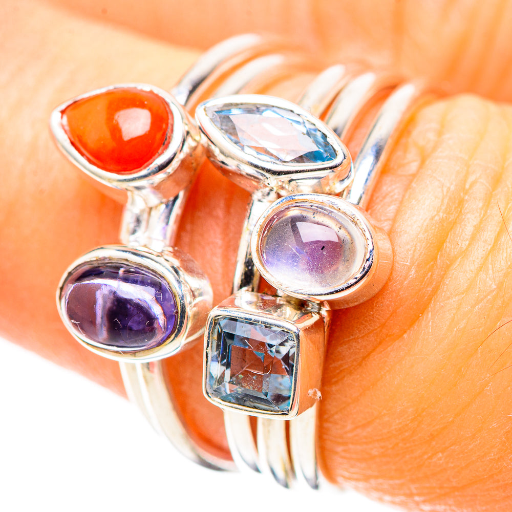 Sterling silver gemstone ring with orange coral, blue topaz, and purple moonstone accents