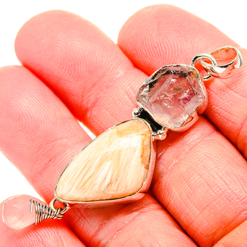Sterling silver pendant with rough pink and peach stones, with small rose quartz bead